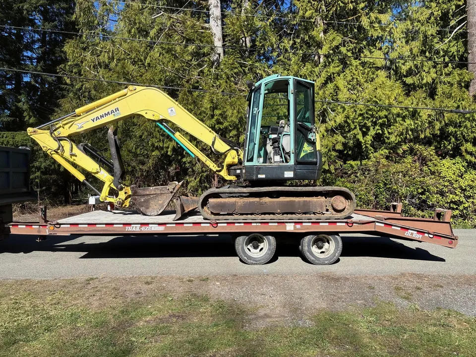 Handy's Construction excavator performing site preparation on a residential lot in Missoula MT